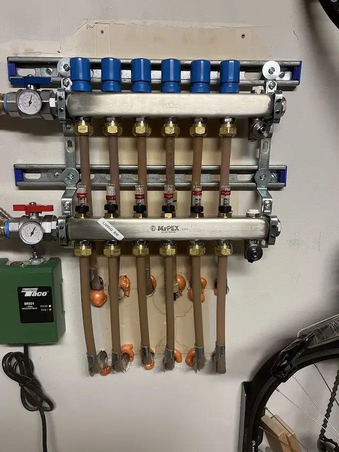 Plumber performing Water Heater Repair at a residential property in Montesano